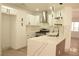 Modern kitchen with white cabinets, quartz counters at 7409 Flat Rock St, Las Vegas, NV 89131