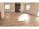 Bright living room with hardwood floors and fireplace at 7409 Flat Rock St, Las Vegas, NV 89131