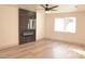 Living room featuring a modern fireplace and hardwood floors at 7409 Flat Rock St, Las Vegas, NV 89131