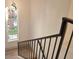 Modern stairs with a metal railing and a view from above at 7409 Flat Rock St, Las Vegas, NV 89131