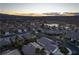 Community view with golf course and lake at sunset at 750 Arguello Cir, Mesquite, NV 89027