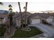 Single-story house with palm trees and mountain views at 750 Arguello Cir, Mesquite, NV 89027