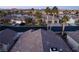 Aerial view of homes and palm trees near lake at 750 Arguello Cir, Mesquite, NV 89027