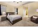 Main bedroom with carpeted floor, walk-in closet, and ensuite bathroom at 750 Arguello Cir, Mesquite, NV 89027