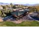 Community clubhouse with Spanish tile roof and pergola at 750 Arguello Cir, Mesquite, NV 89027