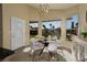 Bright dining area with large windows and backyard view at 750 Arguello Cir, Mesquite, NV 89027