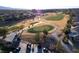 Aerial view of a scenic golf course with rolling hills at 750 Arguello Cir, Mesquite, NV 89027