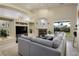 Relaxing living room with fireplace and view of backyard at 750 Arguello Cir, Mesquite, NV 89027