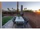 Patio dining set with seating for six, overlooking the lawn at 750 Arguello Cir, Mesquite, NV 89027