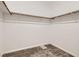 Walk-in closet features carpet, wood clothes rods and supports at 762 Star Estates Ave, North Las Vegas, NV 89086