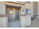 Two-story townhome exterior with gray siding and a front porch at 762 Star Estates Ave, North Las Vegas, NV 89086