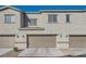 Two-story townhome with attached garage and landscaping at 762 Star Estates Ave, North Las Vegas, NV 89086