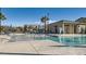 Community pool with surrounding patio and lounge chairs at 762 Star Estates Ave, North Las Vegas, NV 89086