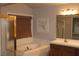 Bathroom boasts a large bathtub and double sinks at 7712 Wedlock Ln, Las Vegas, NV 89129