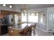 Spacious kitchen featuring stainless steel appliances and an island with seating at 7712 Wedlock Ln, Las Vegas, NV 89129