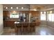 Spacious kitchen featuring stainless steel appliances and an island with seating at 7712 Wedlock Ln, Las Vegas, NV 89129