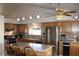 Spacious kitchen featuring stainless steel appliances and an island with seating at 7712 Wedlock Ln, Las Vegas, NV 89129