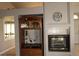 Living room with fireplace and built-in entertainment center at 7712 Wedlock Ln, Las Vegas, NV 89129