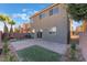 Private backyard with a patio and artificial grass at 8284 Arden Ladder Pl, Las Vegas, NV 89117