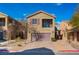 Two-story house with attached garage and landscaped front yard at 8284 Arden Ladder Pl, Las Vegas, NV 89117