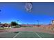 Outdoor basketball court with clear views of the mountains at 844 Via Serenelia, Henderson, NV 89011