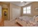 Bedroom with double door closet and view of another room at 844 Via Serenelia, Henderson, NV 89011