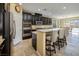 Spacious kitchen with stainless steel appliances and an island at 844 Via Serenelia, Henderson, NV 89011