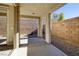 Covered patio with block wall and gravel landscaping at 844 Via Serenelia, Henderson, NV 89011