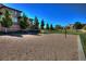 Beach volleyball court set against residential buildings at 844 Via Serenelia, Henderson, NV 89011