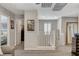 Bright loft hallway showcasing access to laundry and bedrooms at 889 Ariel Heights Ave, Las Vegas, NV 89138