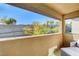 Covered patio with seating area offering scenic views at 889 Ariel Heights Ave, Las Vegas, NV 89138