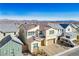 Two-story house with attached garage; neighborhood view at 9008 Rolling Pietra St, Las Vegas, NV 89166