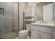 Clean bathroom with a shower, toilet, and white vanity at 9008 Rolling Pietra St, Las Vegas, NV 89166