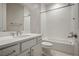 Bathroom with a bathtub, shower, and white vanity at 9008 Rolling Pietra St, Las Vegas, NV 89166