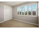 Bright bedroom with double door closet and window shutters at 9008 Rolling Pietra St, Las Vegas, NV 89166