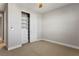 Bedroom with built-in shelving and closet at 9008 Rolling Pietra St, Las Vegas, NV 89166