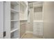 Spacious closet with white shelving and drawers at 9008 Rolling Pietra St, Las Vegas, NV 89166