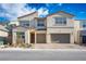 Two-story house with a two-car garage and landscaped front yard at 9008 Rolling Pietra St, Las Vegas, NV 89166