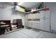 Garage with overhead storage and cabinets at 9008 Rolling Pietra St, Las Vegas, NV 89166