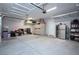 Organized garage with ample storage and shelving at 9008 Rolling Pietra St, Las Vegas, NV 89166