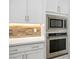 Built-in microwave and oven in a modern kitchen at 9008 Rolling Pietra St, Las Vegas, NV 89166