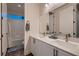 Modern bathroom with double vanity and a separate shower and tub at 9181 Theodore Ct, Las Vegas, NV 89178