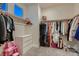 Large walk-in closet with ample hanging and shelving space at 9181 Theodore Ct, Las Vegas, NV 89178