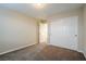 Bright bedroom with double-door closet and access to hallway at 9494 Stillwater Bend Ln, Las Vegas, NV 89178