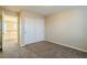 Bedroom with double-door closet and access to upper hallway at 9494 Stillwater Bend Ln, Las Vegas, NV 89178