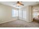 Spacious bedroom with ceiling fan and large closet at 9494 Stillwater Bend Ln, Las Vegas, NV 89178