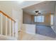 Bright entryway with staircase and view of living room at 9494 Stillwater Bend Ln, Las Vegas, NV 89178