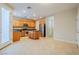 Kitchen with wood cabinets, island, and stainless steel appliances at 9494 Stillwater Bend Ln, Las Vegas, NV 89178