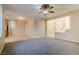 Living room with open floor plan and neutral decor at 9494 Stillwater Bend Ln, Las Vegas, NV 89178