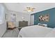 Spacious bedroom featuring a ceiling fan and a wall mounted world map at 10330 Glacier Mist Ave, Las Vegas, NV 89149